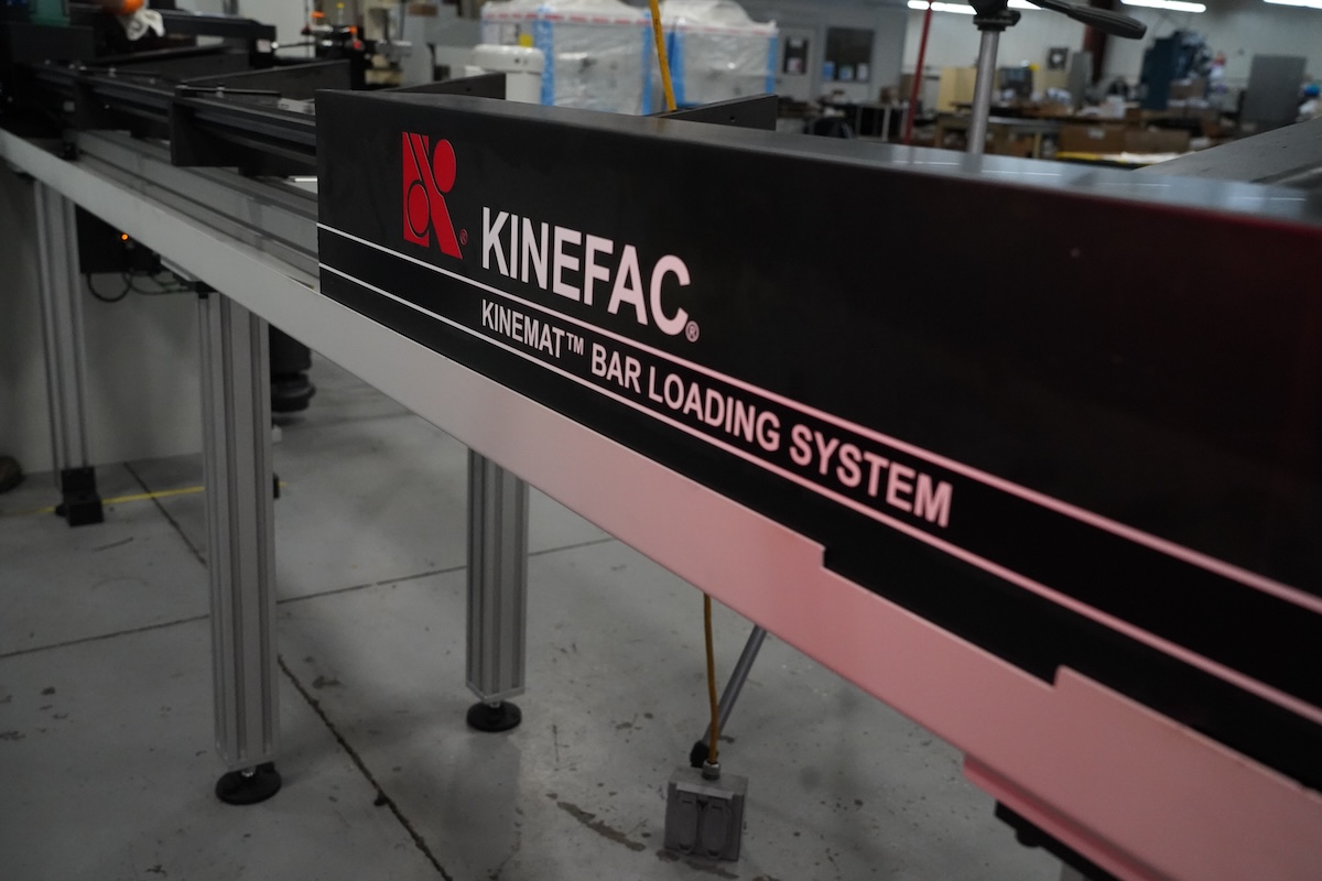 Closeup on the model name displayed on Kinefac's Kinemat Bar Loading System